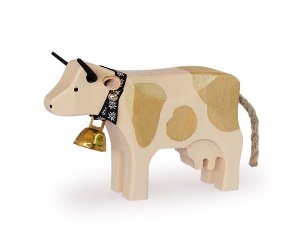 Trauffer Kuh 1 stehend mit goldigen Flecken
